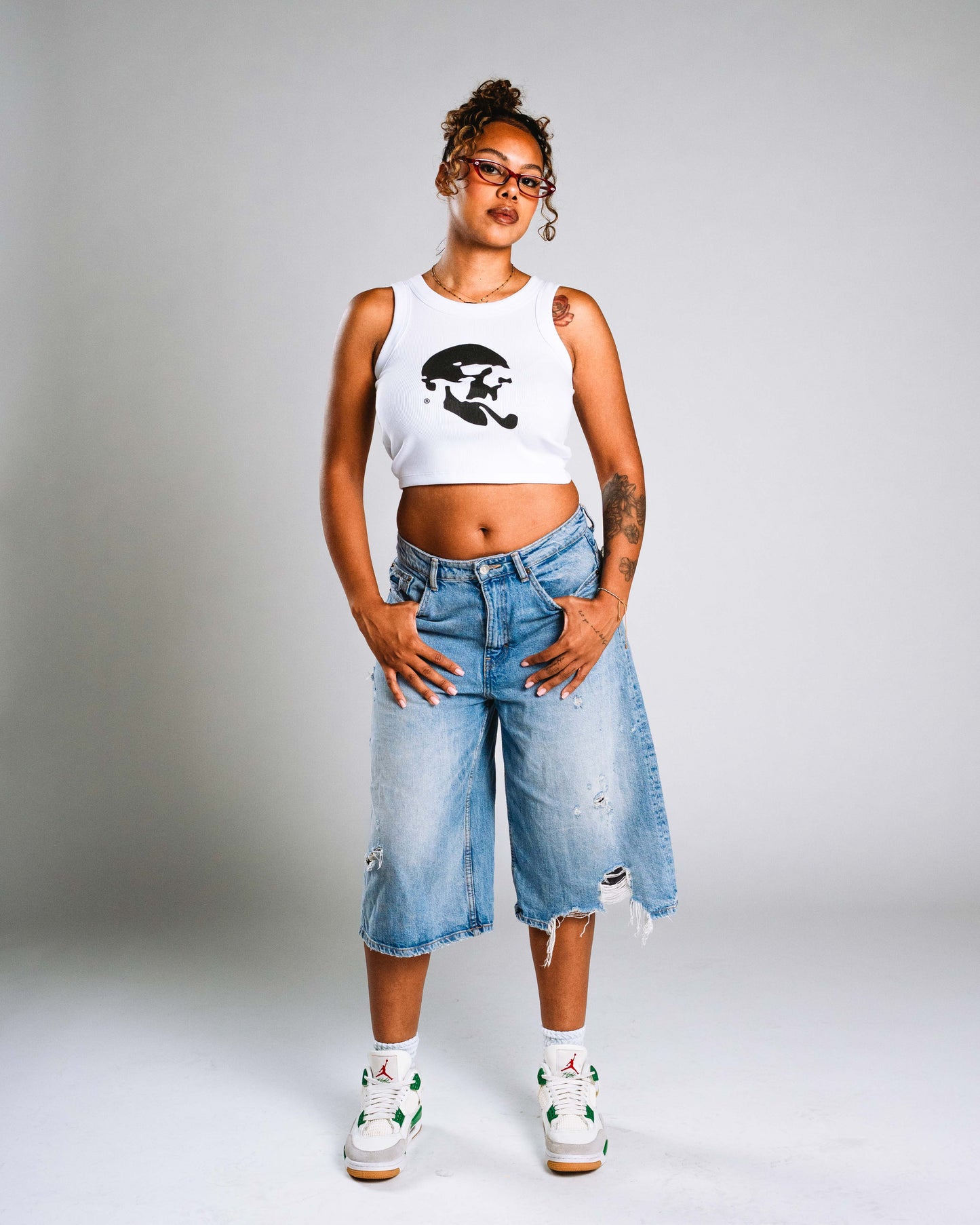 Skelly Basic, A Woman's White Tank (Black Logo)
