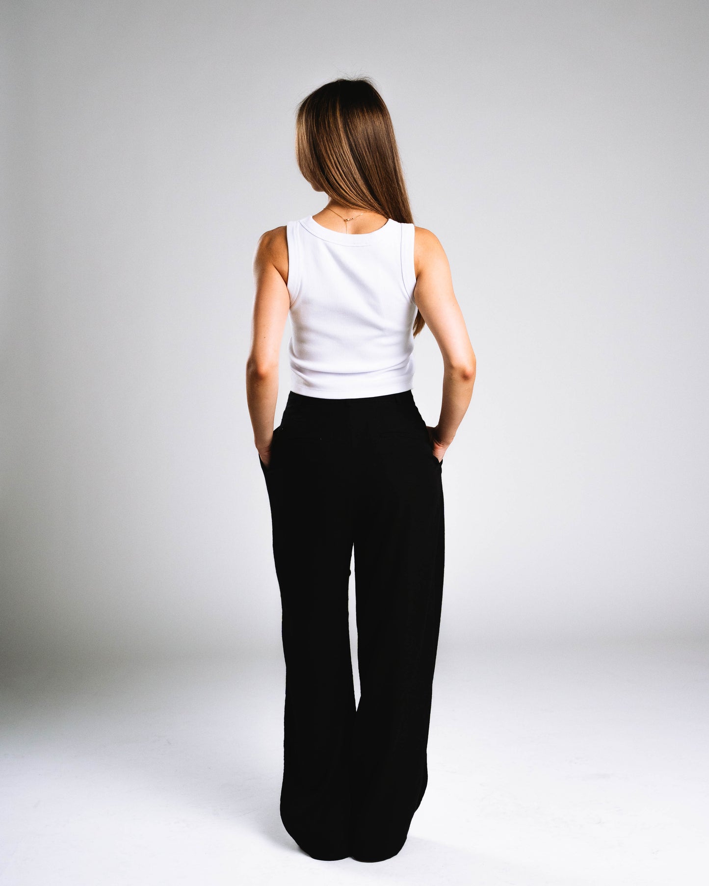 Skelly Basic, A Woman's White Tank (Red Logo)