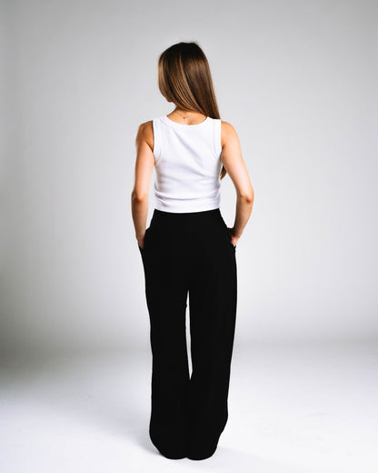 Skelly Basic, A Woman's White Tank (Red Logo)